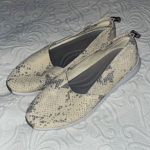 Cole Haan snake skin pattern slip ons.